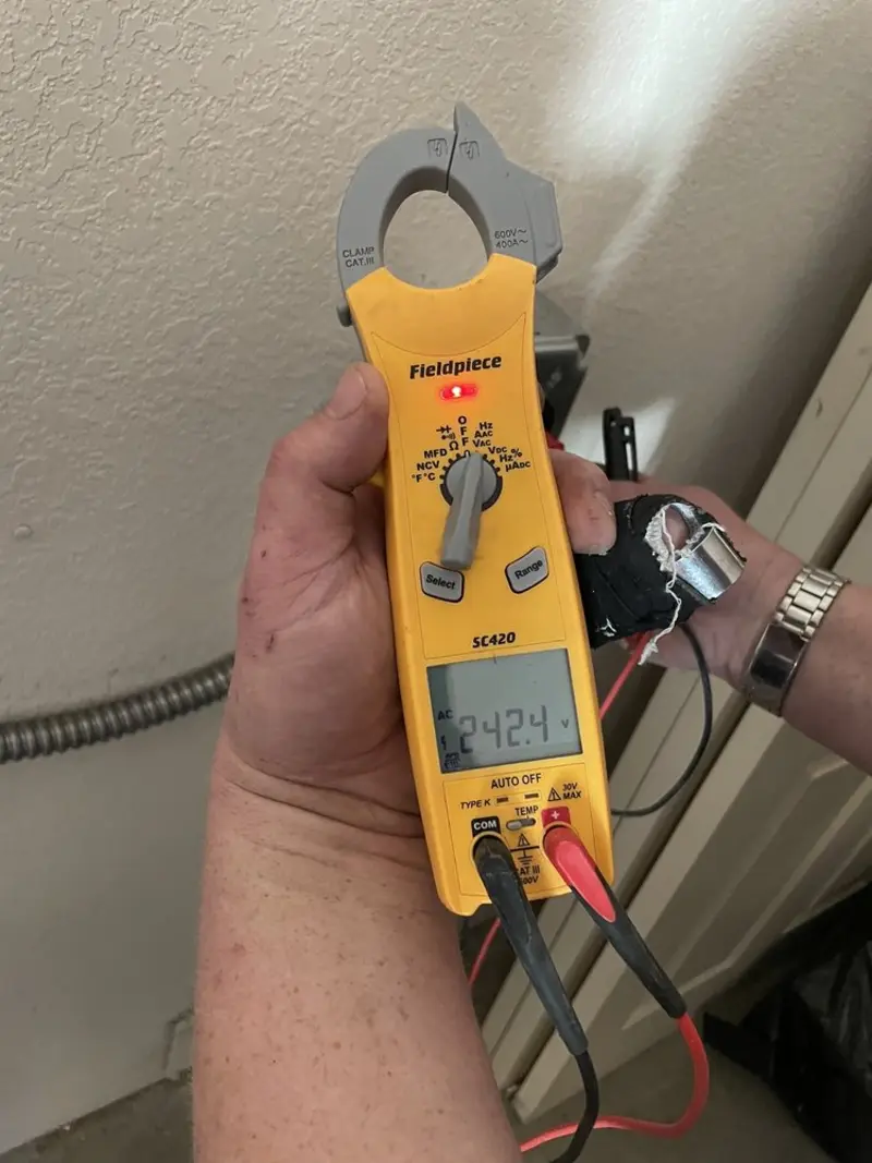 Voltage testing with clamp meter during Electrical Installation Services in Hawthorn Woods